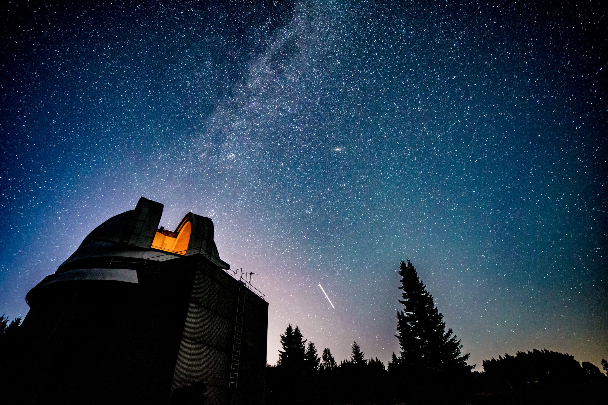 Image showing an observatory and an arc of the Milky Way. Credit: iStock Photo