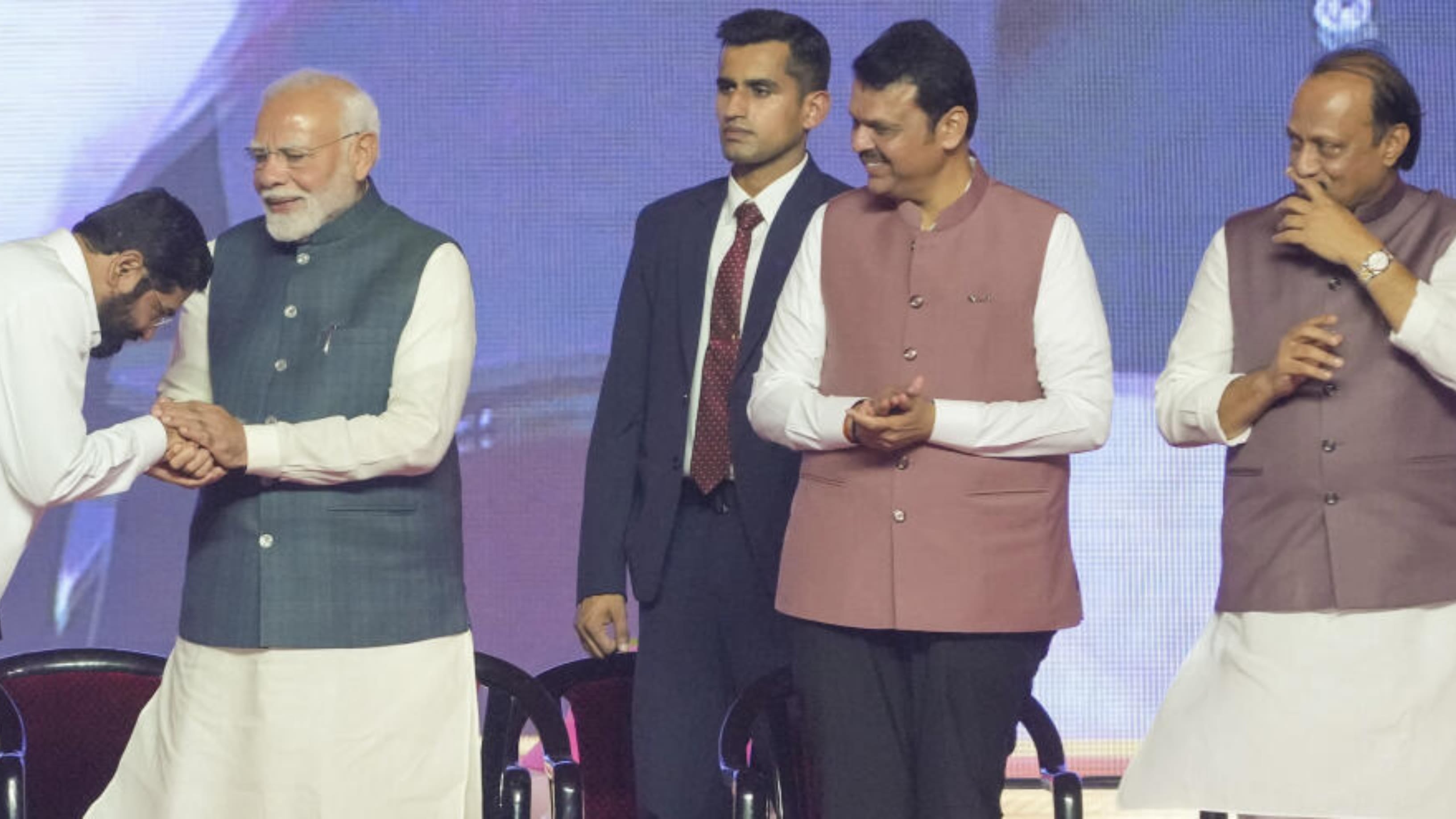 Prime Minister Narendra Modi and Maharashtra Governor CP Radhakrishnan with the newly-sworn Maharashtra Chief Minister Devendra Fadnavis and Deputy Chief Ministers Eknath Shinde and Ajit Pawar during the swearing-in ceremony, in Mumbai. Credit: PTI Photo