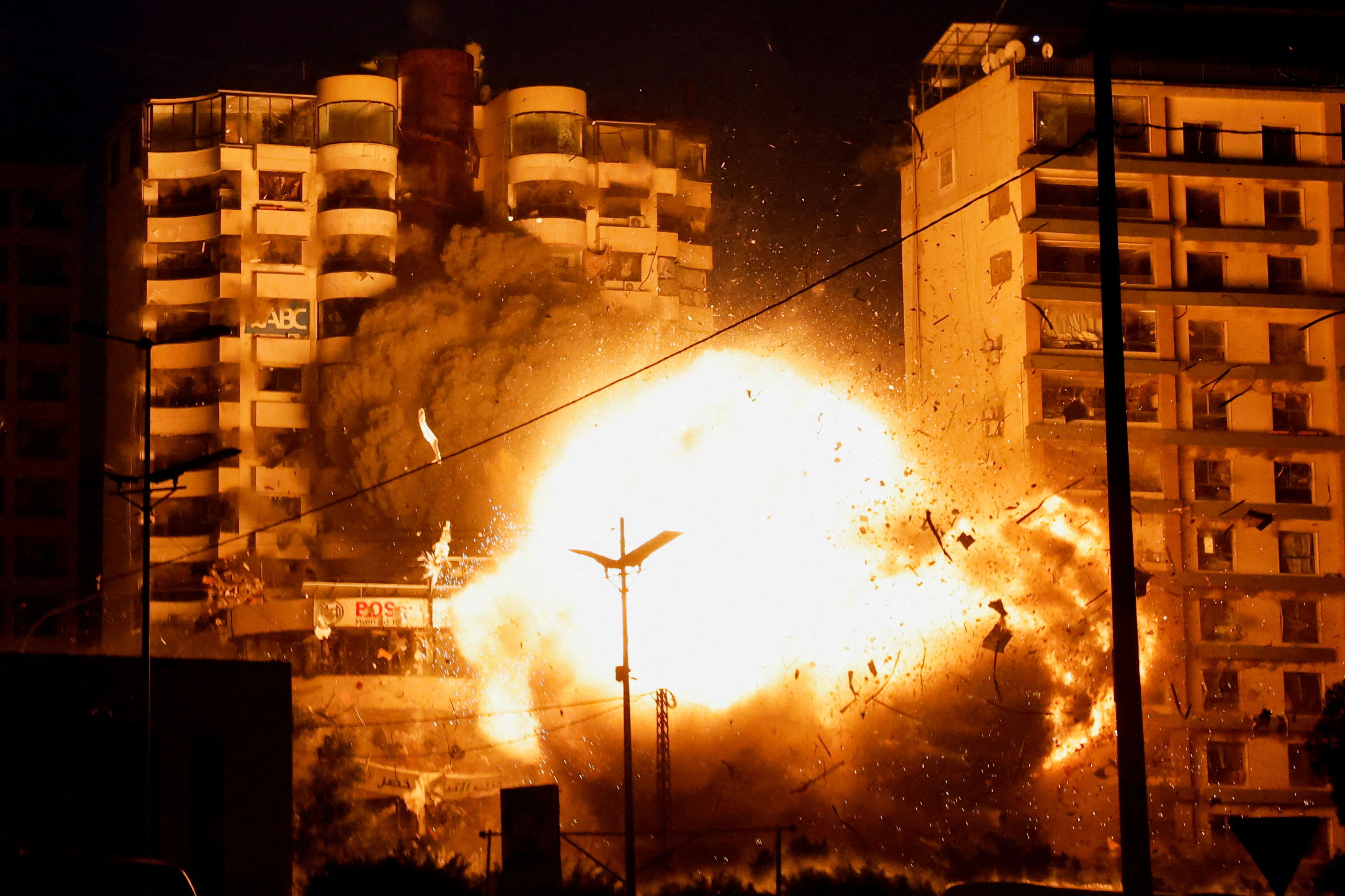 A view shows the moment of an Israeli strike on a building, amid the ongoing hostilities between Hezbollah and Israeli forces, in the Chiyah district of Beirut's southern suburbs, Lebanon, November 25, 2024. Credit: Reuters File Photo