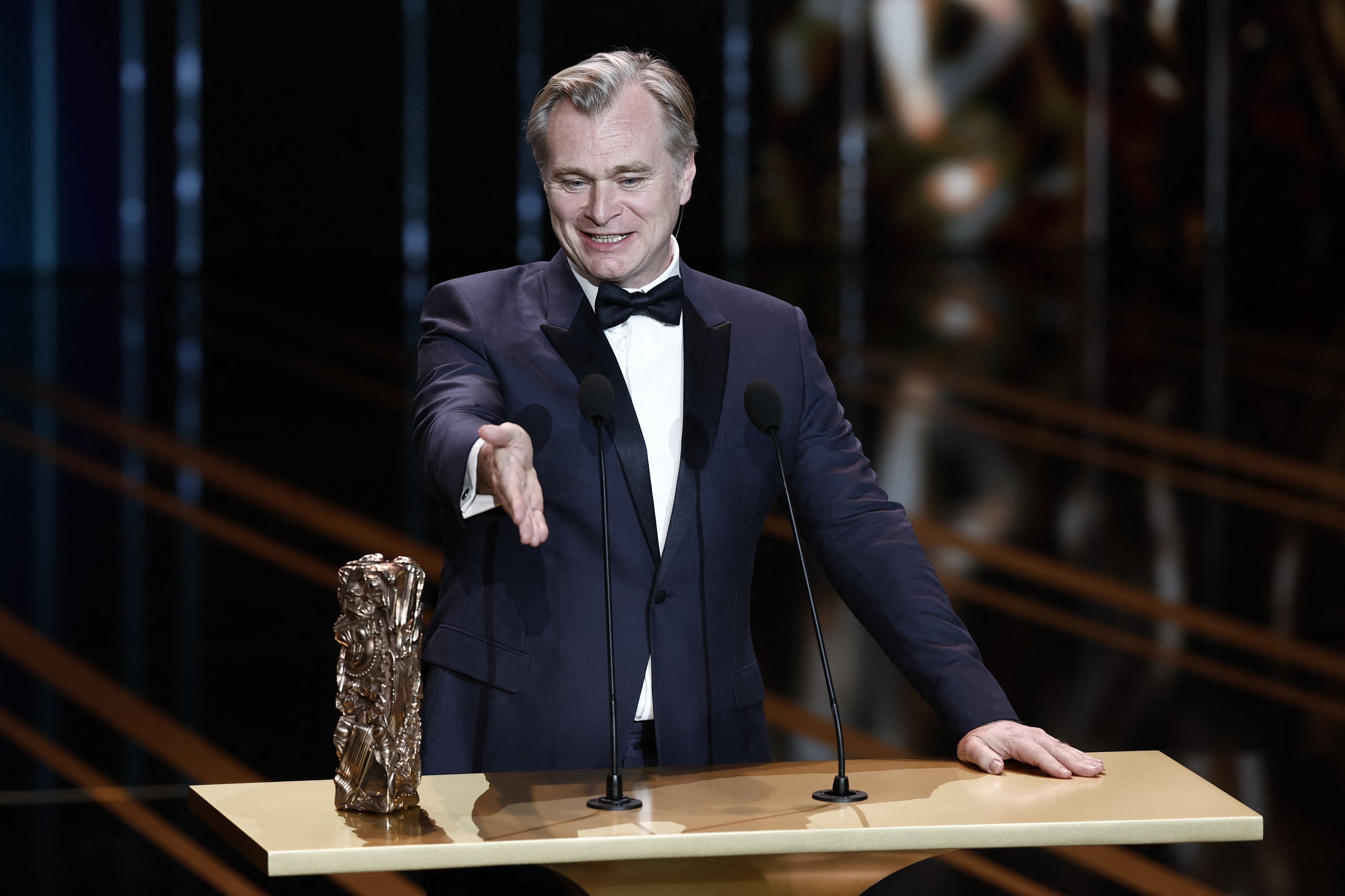 Director Christopher Nolan reacts as he receives his Honorary Cesar Award during the 49th Cesar Awards ceremony in Paris, France, February 23, 2024. Credit: Reuters File Photo